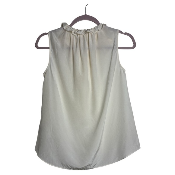 Kate Spade Cream Ruffle Neck Blouse
100% Silk - Picture 3 of 5